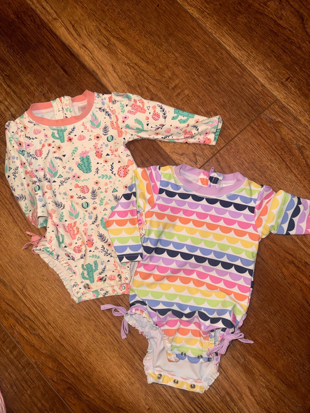 Ruffle Butts Rainbow Scallop & Cactus Print One-Pieces in Pastel Colors
